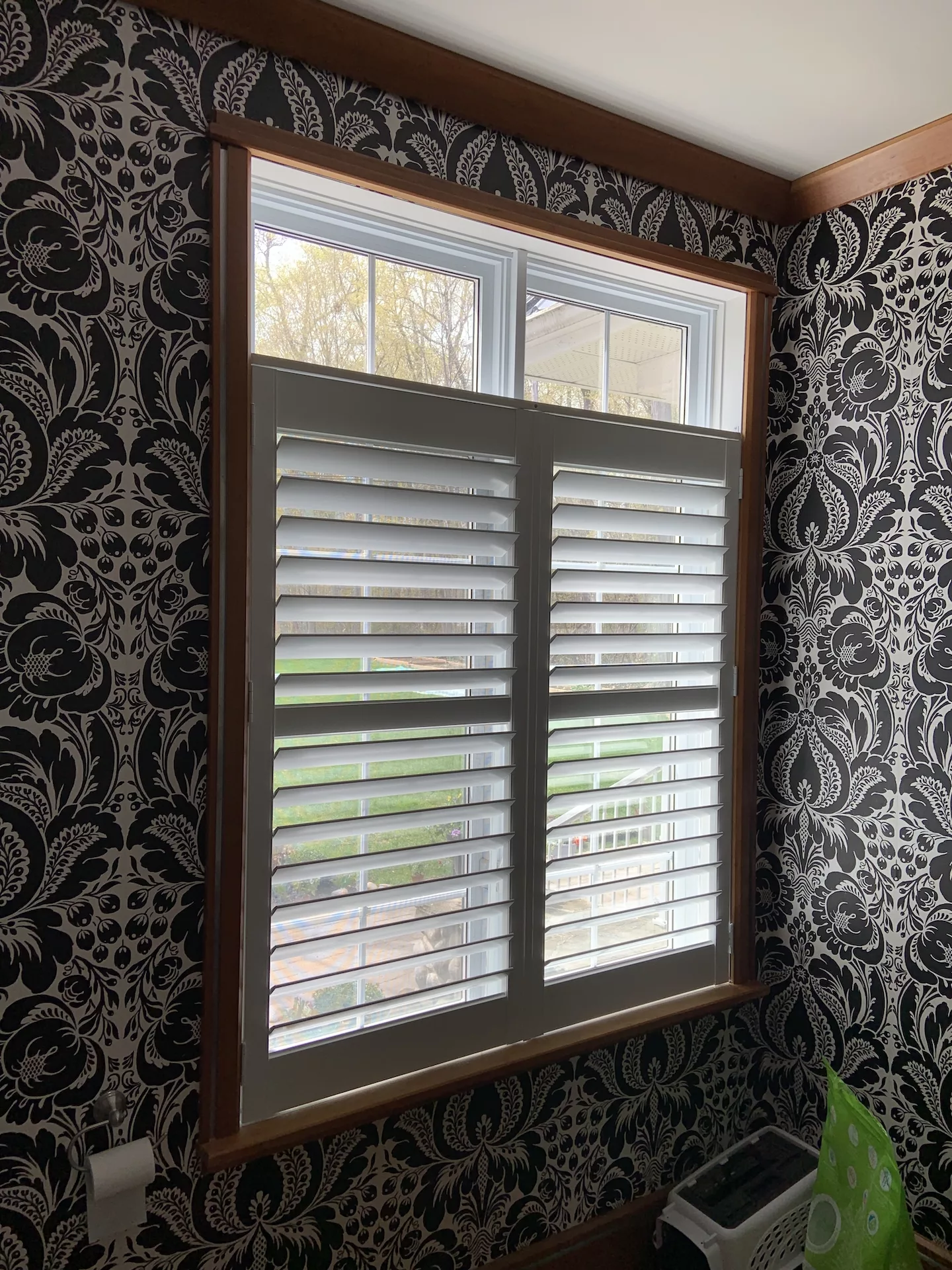 Washroom with customized California shutters (after)