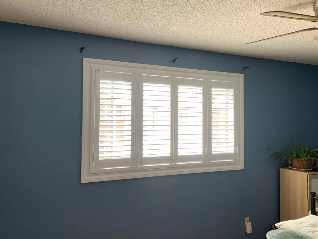 Bedroom windows with PVC california shutters by ShutterLux Scarborough