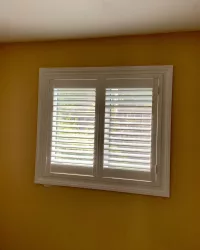 Bedroom windows with PVC california shutters by ShutterLux Scarborough